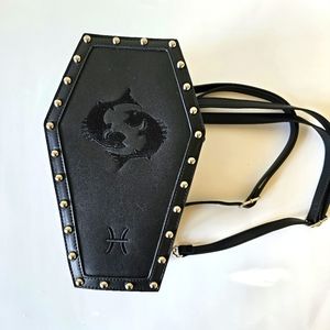 Coffin shaped purse, adjustable straps for backpack or shoulder